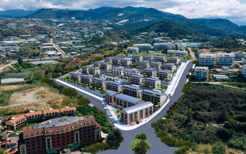 Rummelige lejligheder med havudsigt i et boligkompleks med stort grønt område