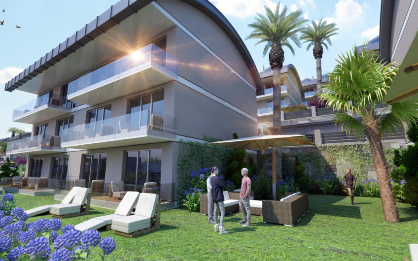 Rummelige lejligheder med havudsigt i et boligkompleks med stort grønt område