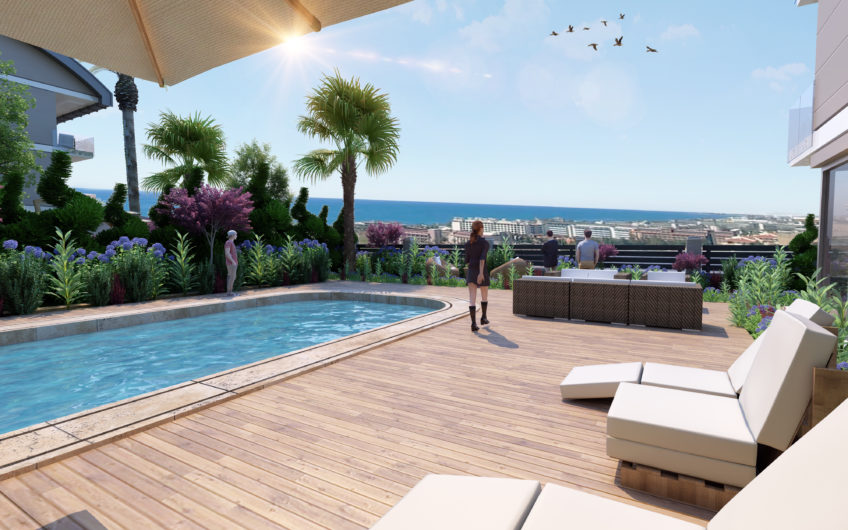 Rummelige lejligheder med havudsigt i et boligkompleks med stort grønt område