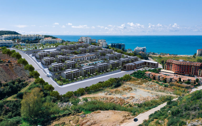 Rummelige lejligheder med havudsigt i et boligkompleks med stort grønt område