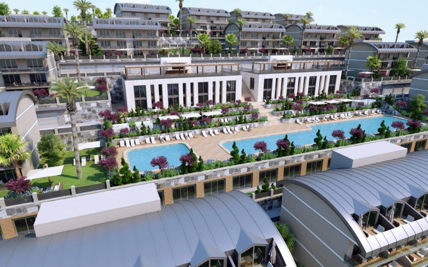 Rummelige lejligheder med havudsigt i et boligkompleks med stort grønt område