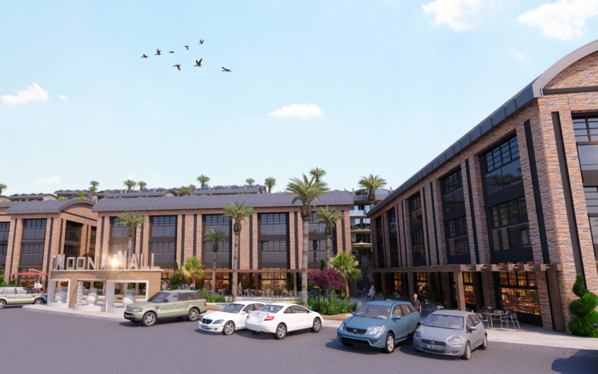 Rummelige lejligheder med havudsigt i et boligkompleks med stort grønt område